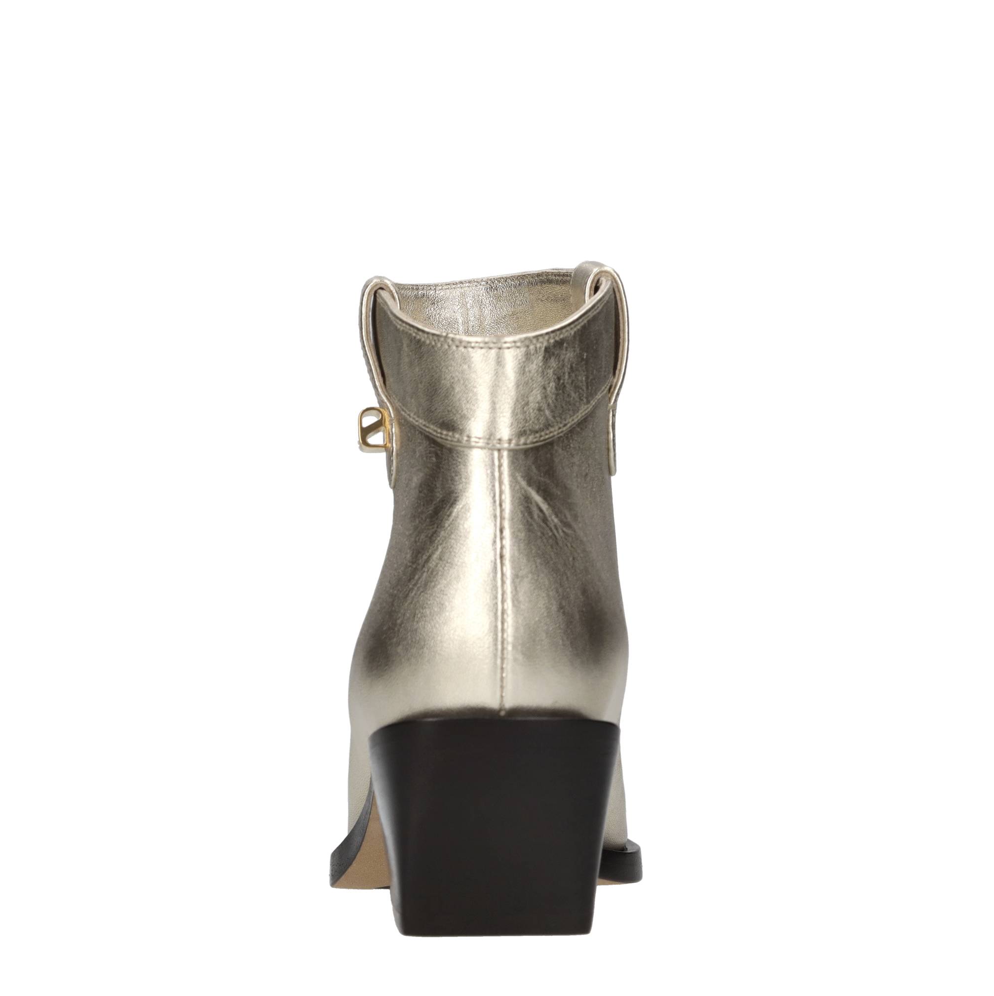 Skorpios Botas de oro